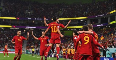 Marco Asensio (C) and Jordi Alba of Spain celebrate after Asensio scored the 2-0 goal during the FIFA World Cup 2022 group E soccer match between Spain and Costa Rica at Al Thumama Stadium in Doha, Qatar, Nov. 23, 2022. (EPA Photo)