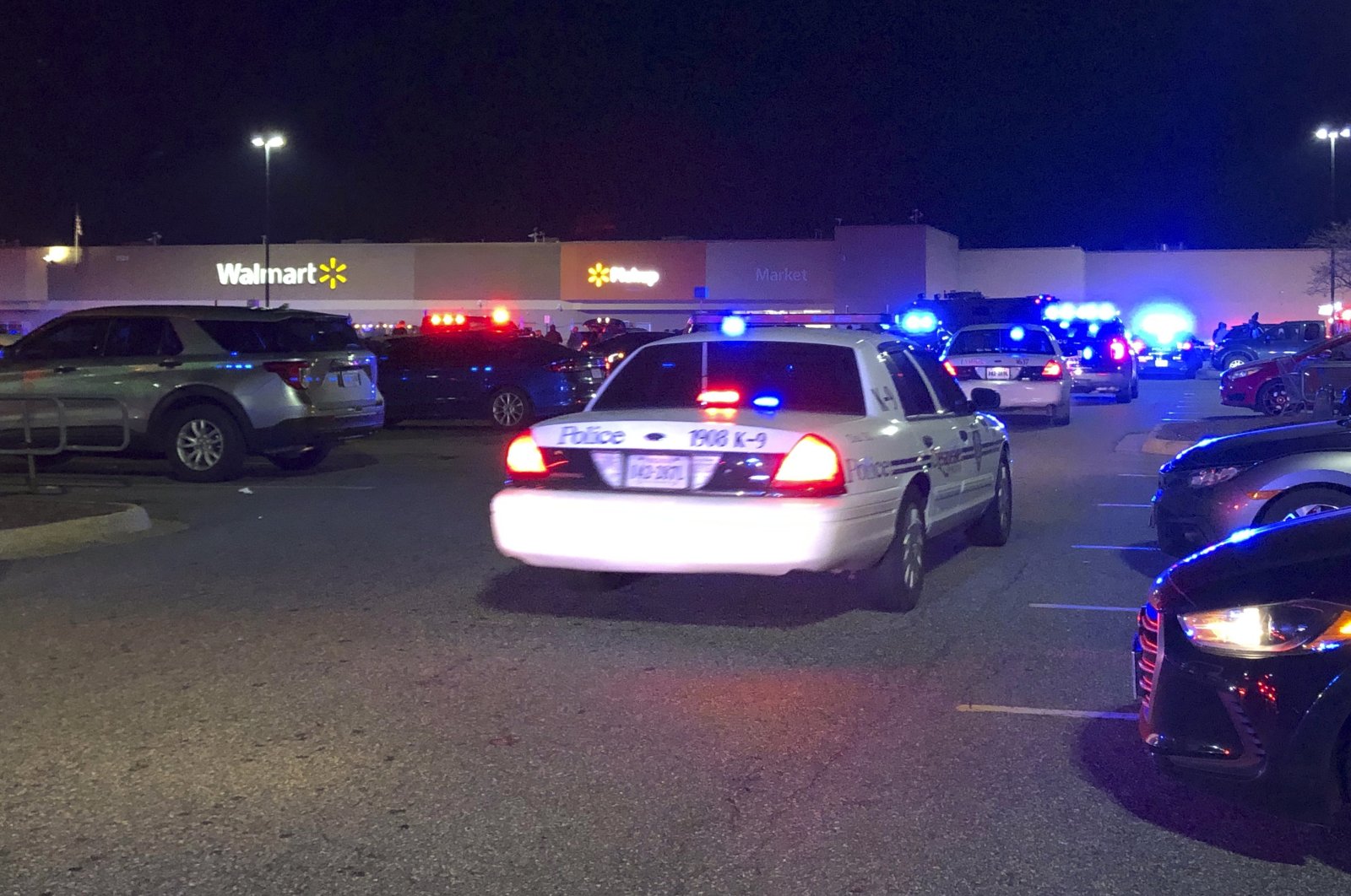 Virginia police respond to the scene of a fatal shooting at a Walmart, Chesapeake, Virginia, U.S., Nov. 22, 2022. (AP Photo)