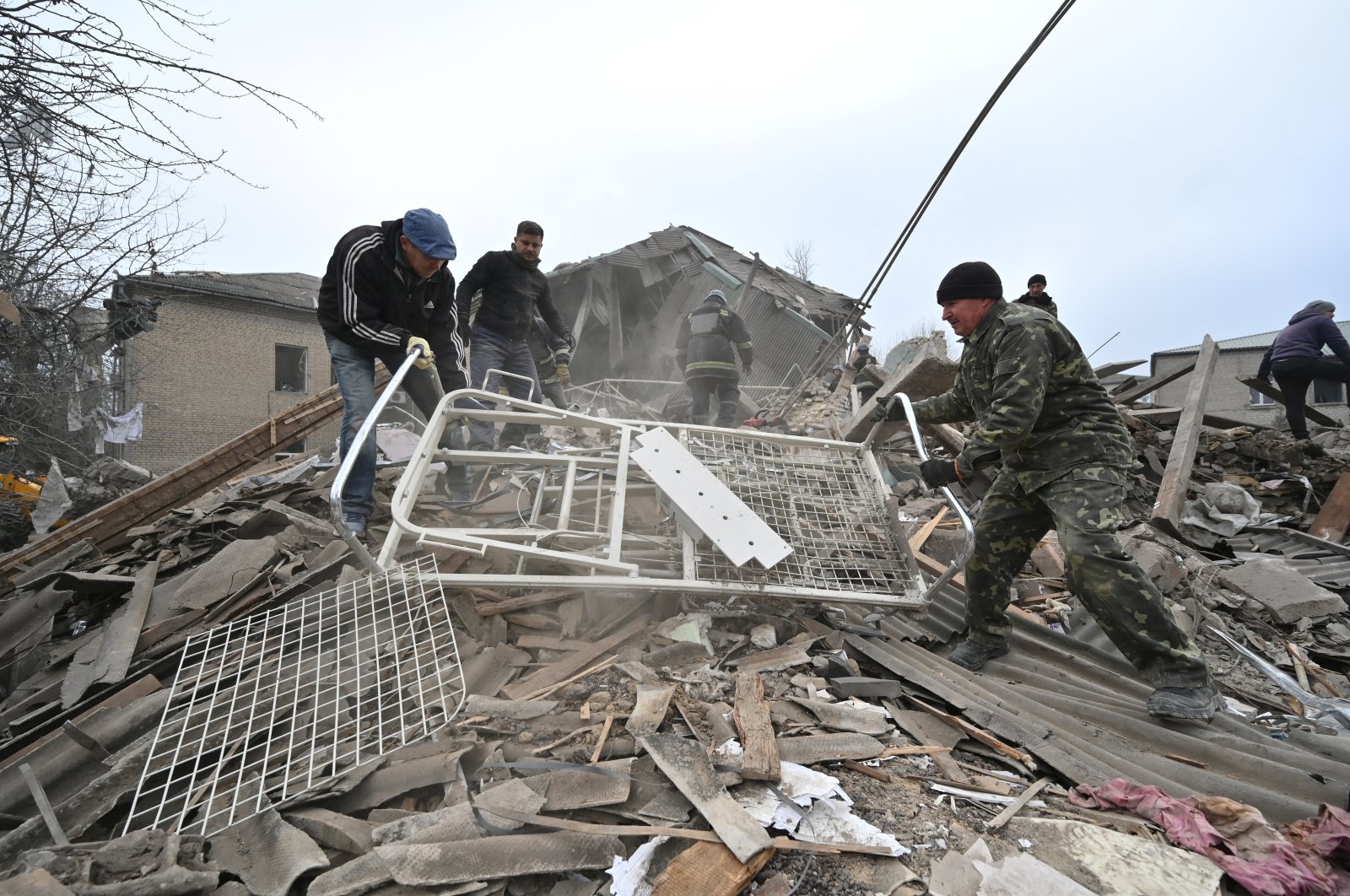 Rescuers work at the site of a maternity ward of a hospital destroyed by a Russian missile attack, Vilniansk, Zaporizhzhia region, Ukraine, Nov. 23, 2022. (Reuters Photo)