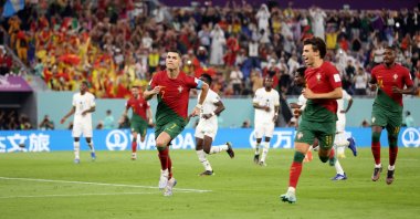 Cristiano Ronaldo celebrates scoring their first goal with Joao Felix during the Qatar 2022 World Cup Group H football match between Portugal and Ghana at Stadium 974, Doha, Qatar, Nov. 24, 2022. (AFP Photo)