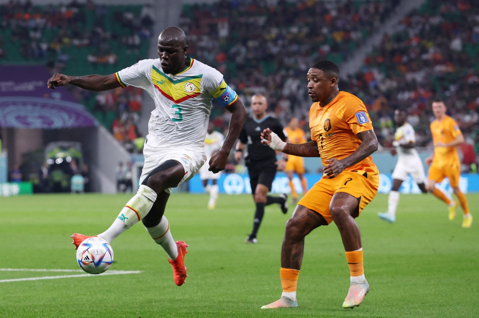 Senegal&#039;s Kalidou Koulibaly in action with Netherlands&#039; Steven Bergwijn in the Senegal versus Netherlands match at the Al Thumama Stadium, Doha, Qatar, Nov. 21, 2022. (Reuters Photo)