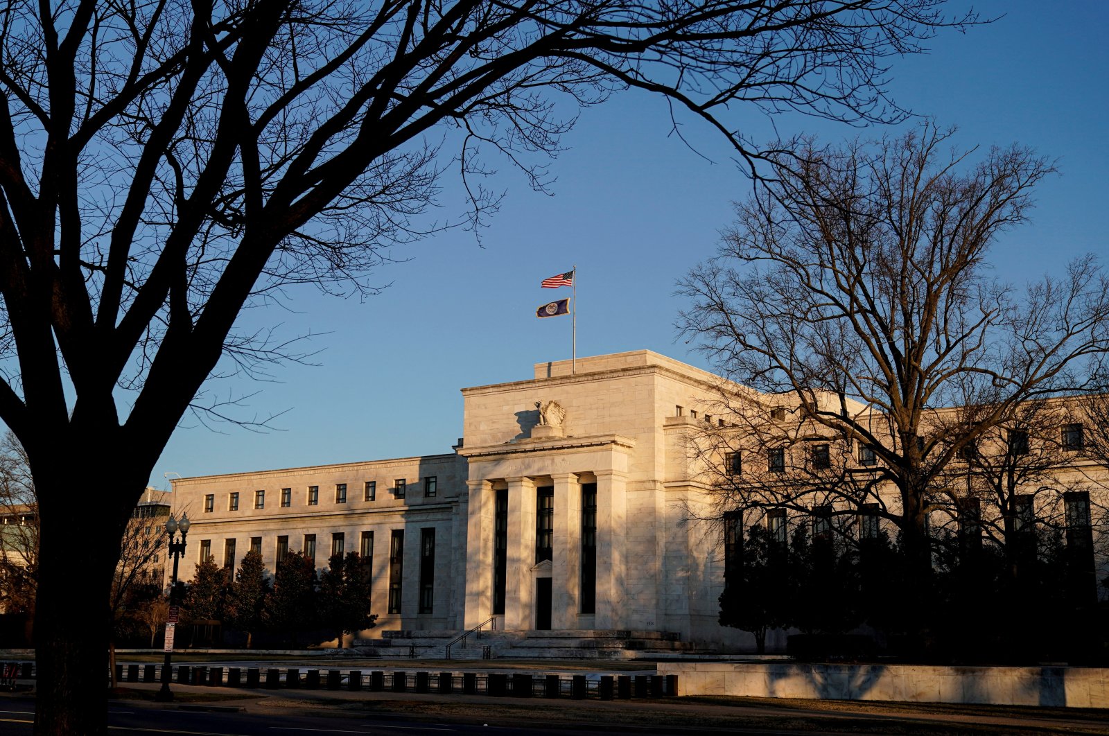The Federal Reserve building is seen before its board is expected to signal plans to raise interest rates in March as it focuses on fighting inflation, Washington, U.S., Jan. 26, 2022.   