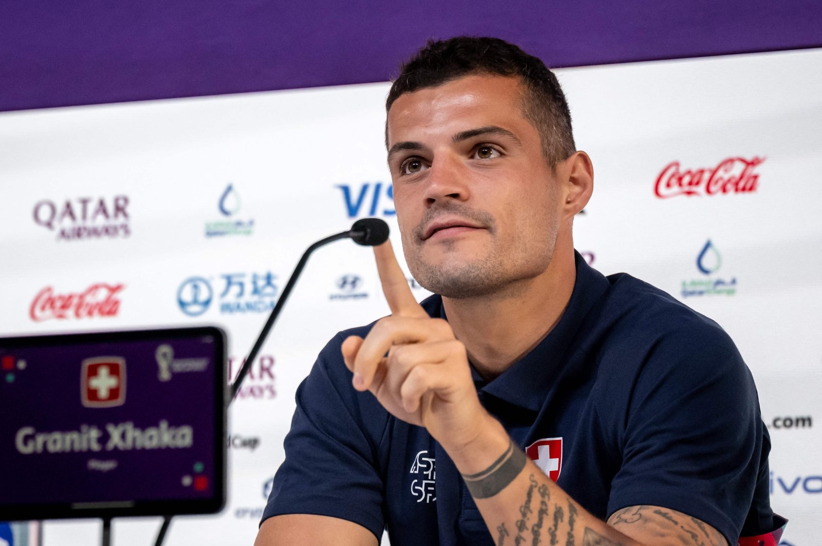 Switzerland&#039;s midfielder Granit Xhaka attends a press conference on the eve of the Qatar 2022 World Cup football match between Switzerland and Cameroon. Doha, Qatar, Nov. 23 2022. (AFP Photo)