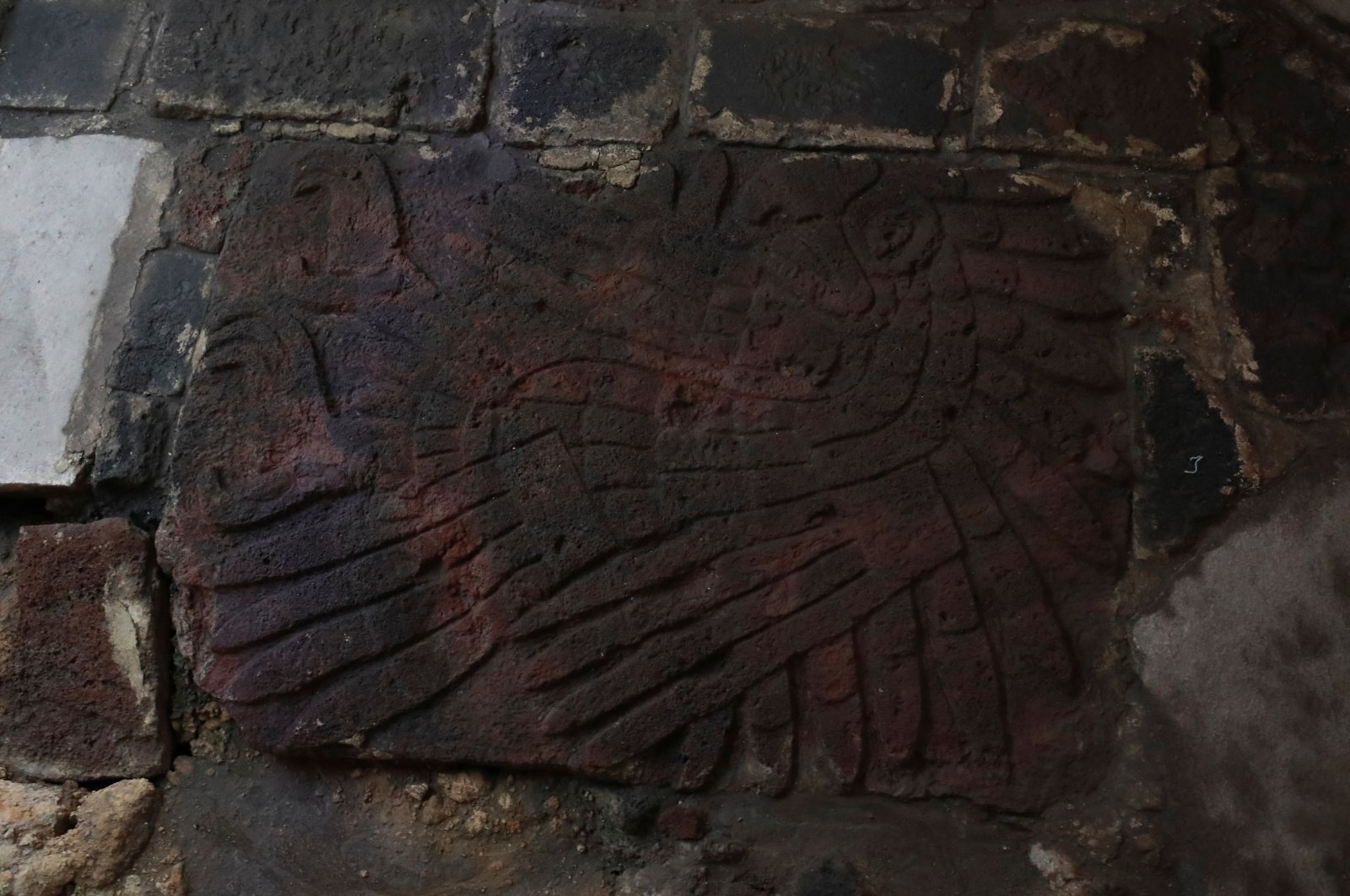 A carved relief sculpture of an eagle is seen near where several ritual offerings have recently been found just off the steps of the Templo Mayor, Mexico City, Mexico, Nov. 15, 2022. (Reuters Photo)