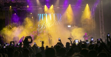 Zeynep Bastık performs at a concert, in Mersin, Türkiye, Nov. 7, 2022. (IHA Photo)