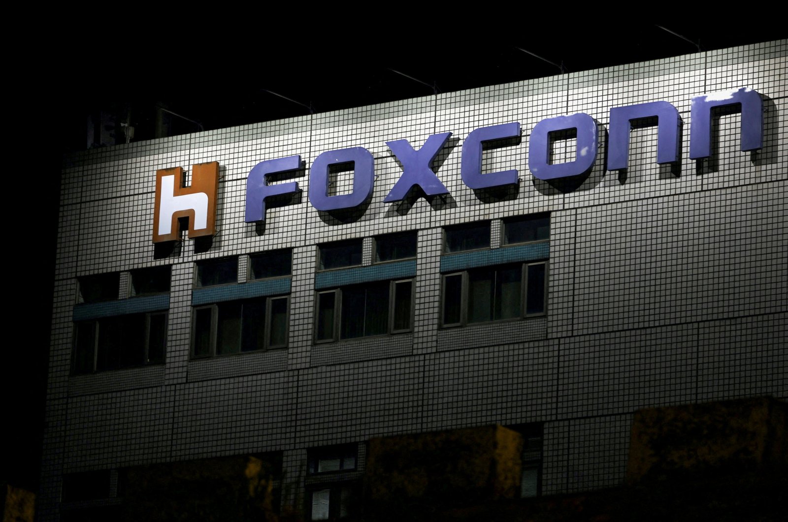 The logo of Foxconn is seen outside the company&#039;s building in Taipei, Taiwan, Nov.,10, 2022. (Reuters Photo)