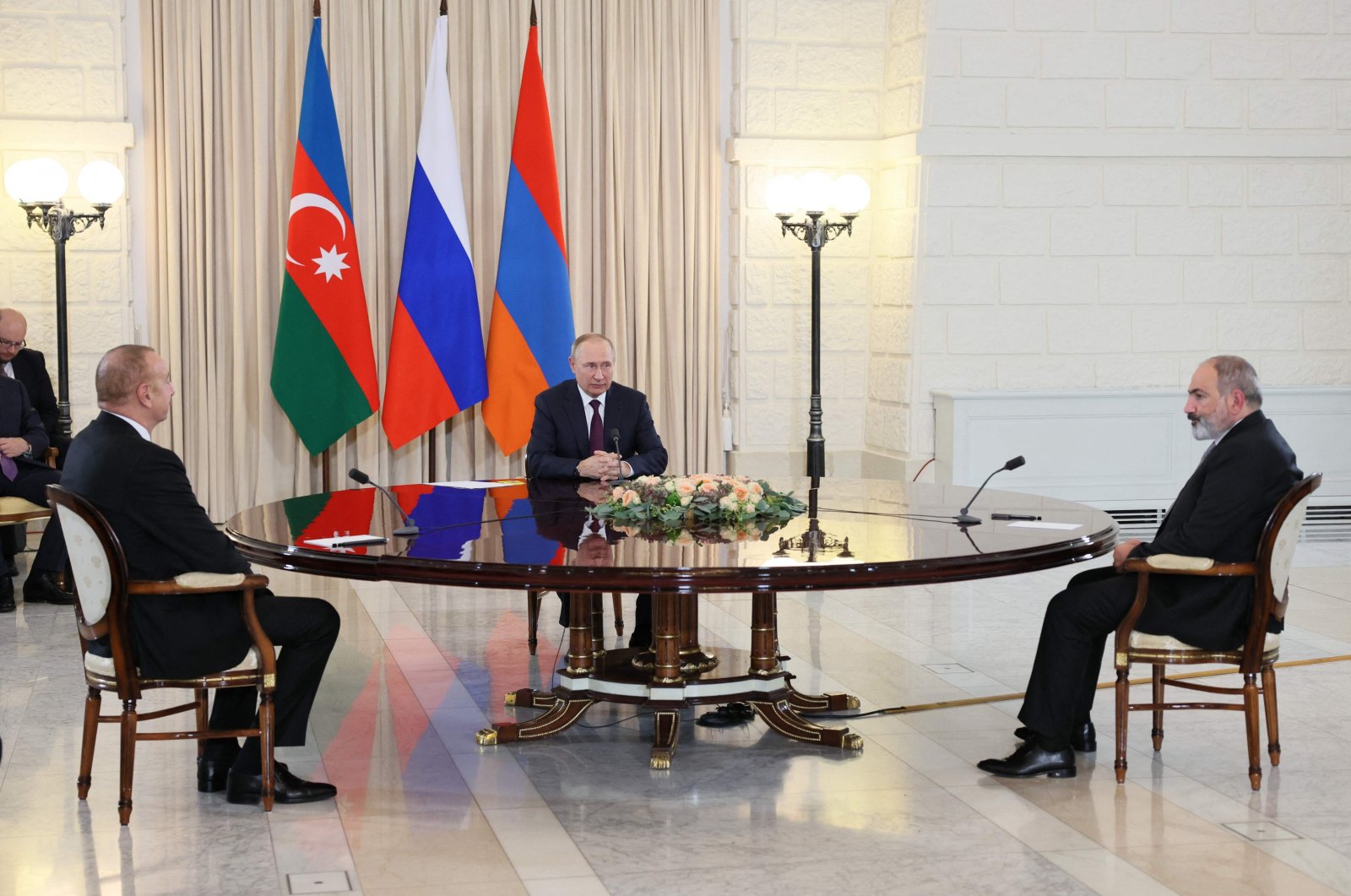 Russian President Vladimir Putin (C), Armenian Prime Minister Nikol Pashinyan (R) and Azerbaijani President Ilham Aliyev hold talks in the Black Sea resort city of Sochi, Russia, Oct. 31, 2022. (AFP Photo)