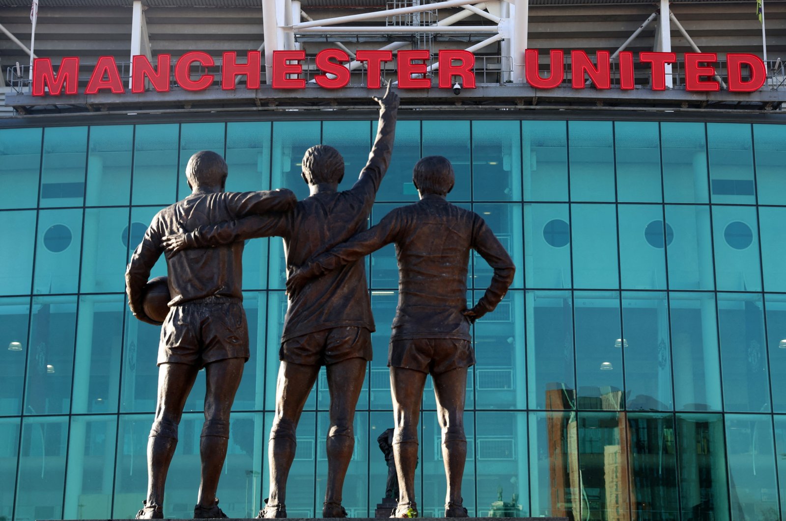 General view of the United Trinity statue outside Old Trafford, Manchester, England. (Reuters Photo)