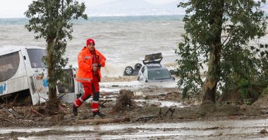 Damaged cars are seen in the sea, following a landslide on the Italian holiday island of Ischia, Italy, Nov. 26, 2022. (Reuters Photo)