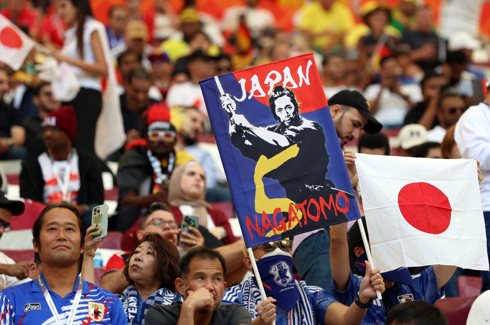 Japan fans display a banner inside the stadium before their team&#039;s World Cup match, Doha, Qatar, Nov. 23, 2022. (Reuters Photo)