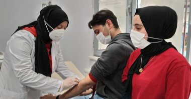 A newly married couple planning to become parents are screened for spinal muscular atrophy (SMA) at Ağcılar Family Health Center No. 30, Istanbul, Türkiye, Dec. 12, 2021. (AA Photo)