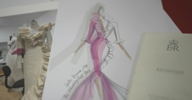 A sketch of an evening gown designed for the then Lady Diana Spencer by British designer Elizabeth Emanuel is displayed, in London, U.K., Nov. 18, 2022. (AP Photo)