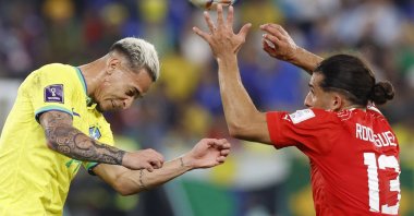 Antony (L) of Brazil in action against Ricardo Rodriguez of Switzerland during the FIFA World Cup 2022 group G soccer match between Brazil and Switzerland at Stadium 947 in Doha, Qatar, Nov. 28, 2022.  (EPA Photo)