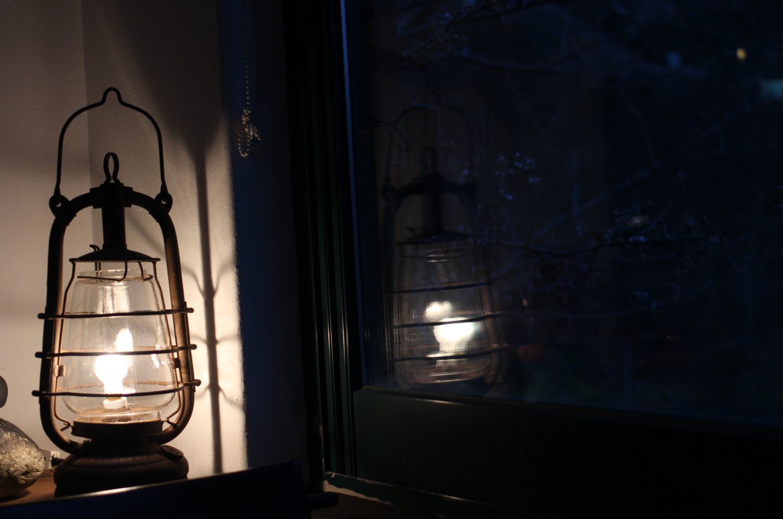 A gaslight lights up a dark room, figuratively representing the opposite of the word&#039;s verb form, which refers to manipulating, grossly misleading, downright deceitful behavior. (Shutterstock Photo)