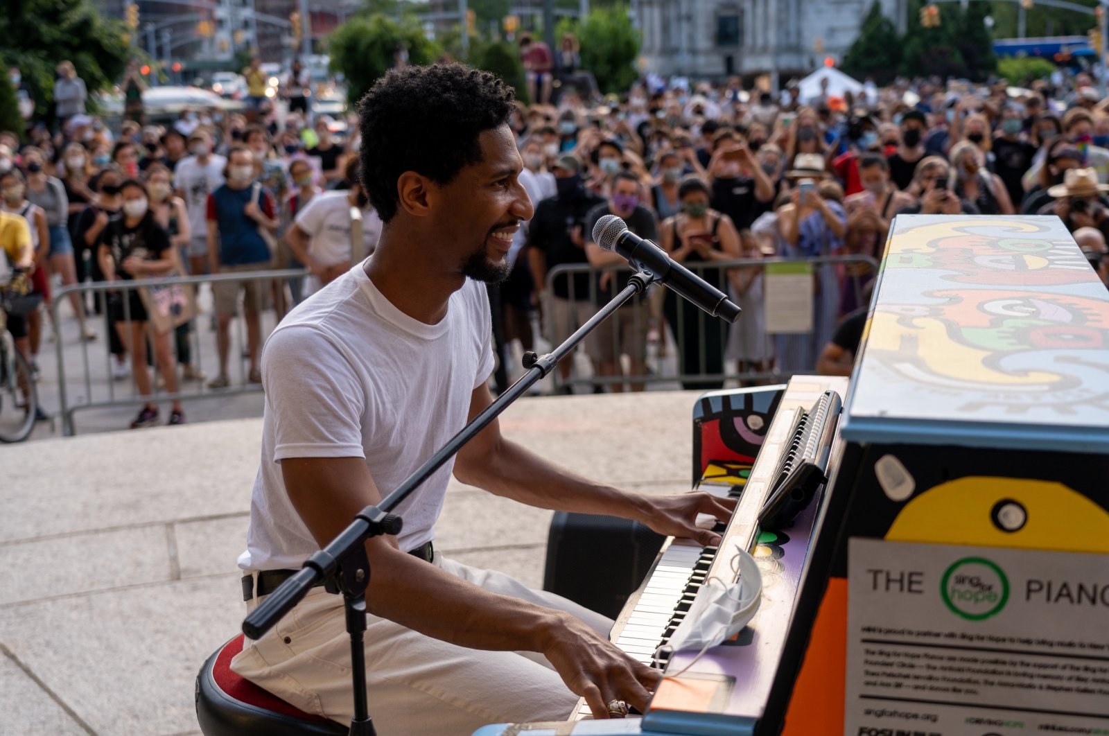 Musician Jon Batiste performs live in concert on Juneteenth on the steps of the Brooklyn Public Library at the Grand Army Plaza, New York, U.S., June 19, 2020. (Shutterstock Photo)