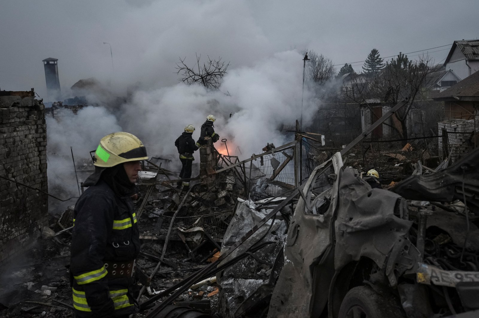 Rescuers work at a site of private houses heavily damaged by a Russian missile strike, amid Russia&#039;s attack on Ukraine, in Dnipro, Ukraine, Nov. 26, 2022. (Reuters Photo)
