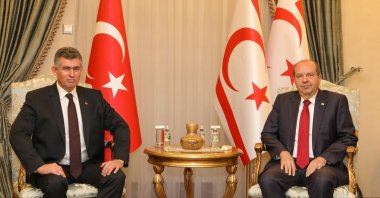 Turkish Republic of Northern Cyprus (TRNC) President Ersin Tatar (R) and Türkiye’s Ambassador to Lefkoşa (Nicosia) Metin Feyzioğlu (L) pose for a picture after Feyzioğlu presents Tatar a letter of trust in Lefkoşa (Nicosia), TRNC, Nov. 29, 2022. (AA Photo)
