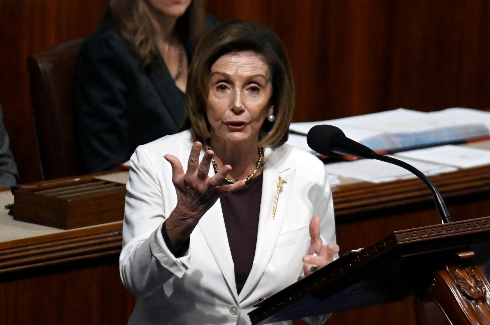 Outgoing U.S. Speaker of the House of Representatives Nancy Pelosi (C), Democrat of California, speaks in the House Chamber in Washington, DC, U.S., Nov. 17, 2022. (AFP Photo)