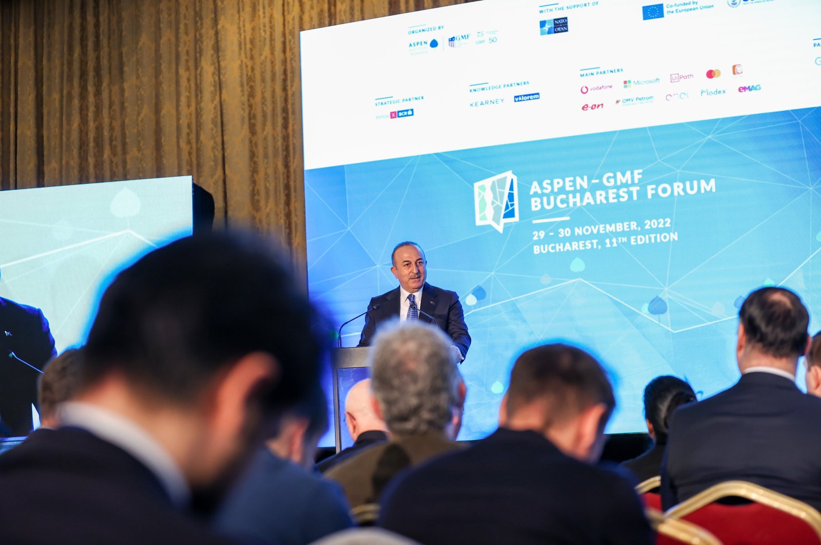 Foreign Minister Mevlüt Çavuşoğlu speaks at the Aspen-GMF Bucharest Forum in Romania, Nov. 29, 2022. (AA Photo)