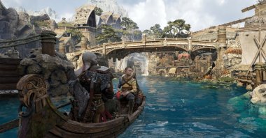 Kratos (L) and his son Atreus, in a scene from the game God of War: Ragnarok. (dpa Photo)