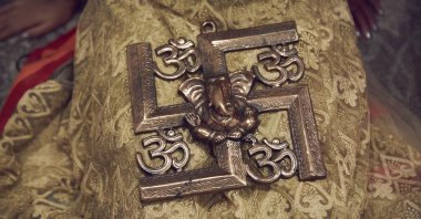 A Hindu swastika symbol is displayed at the home of Sheetal and Sanmeet Deo, in Syosset, New York, U.S., Nov. 13, 2022. (AP Photo)