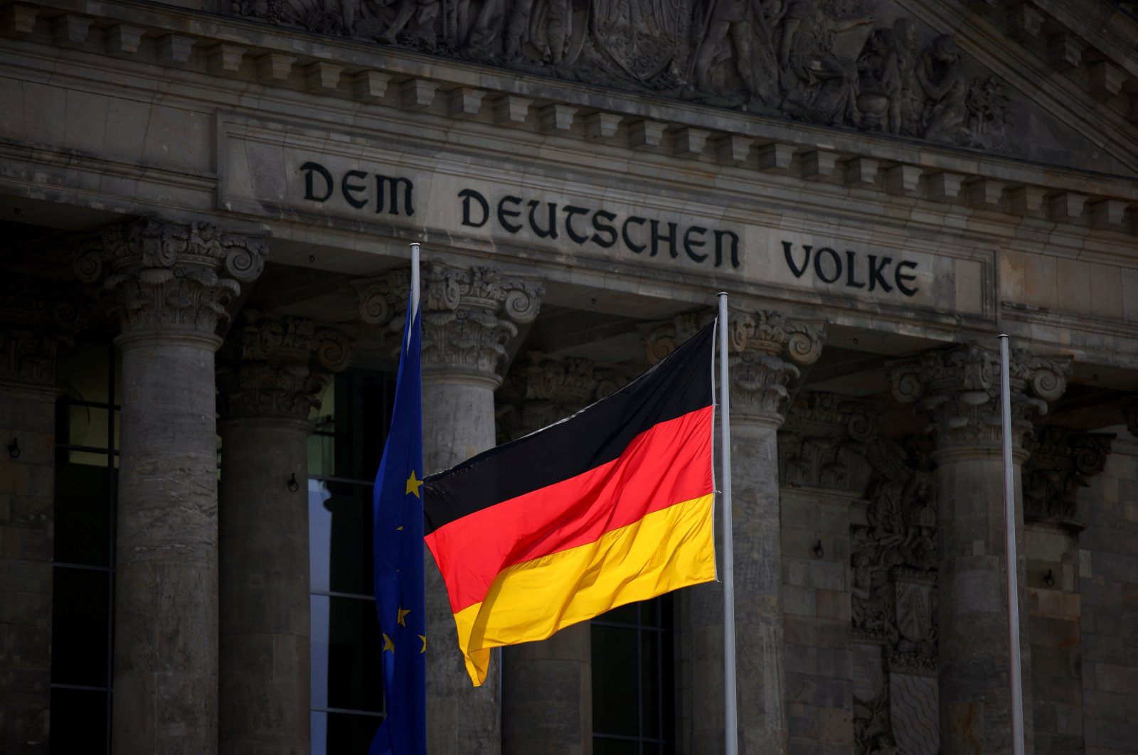 The German national flag flies in front of the Reichstag building, the seat of the lower house of the parliament, in Berlin, Germany, April 5, 2022. (Reuters Photo)