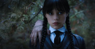 Jenna Ortega stars as Wednesday Addams alongside "Thing" in Netflix's revival of the Addams Family show. (dpa Photo)