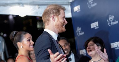 Britain&#039;s Prince Harry and Meghan Markle, Duke and Duchess of Sussex, arrive for the annual Salute to Freedom Gala at the Intrepid Sea, Air & Space Museum in Manhattan in New York City, U.S., Nov 10, 2021. (Reuters Photo)
