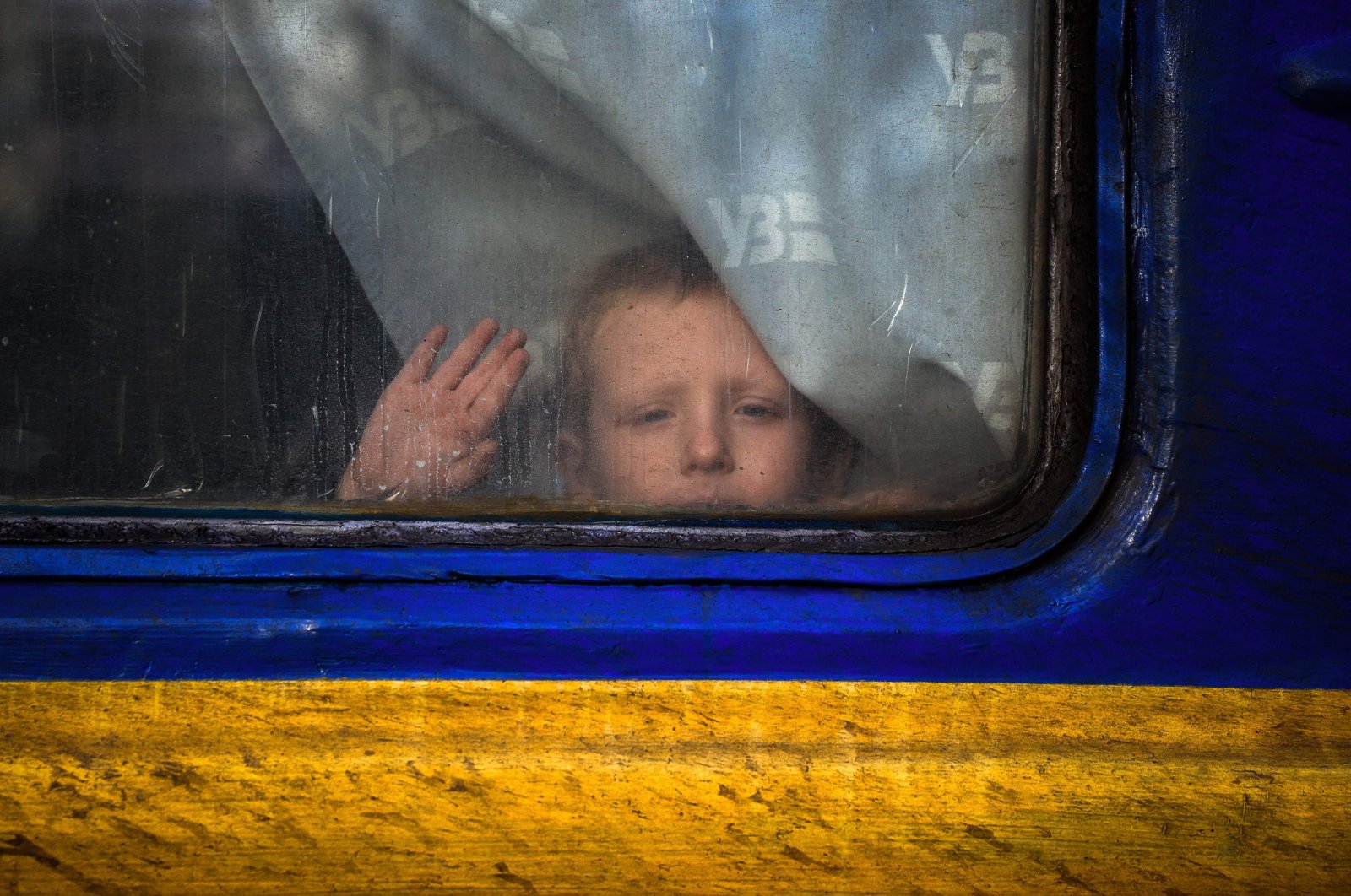 A child looks through a evacuation train&#039;s window in Pokrovsk amid the Russian invasion of Ukraine, in the Donetsk region, Ukraine, Nov. 30, 2022. (AFP Photo)