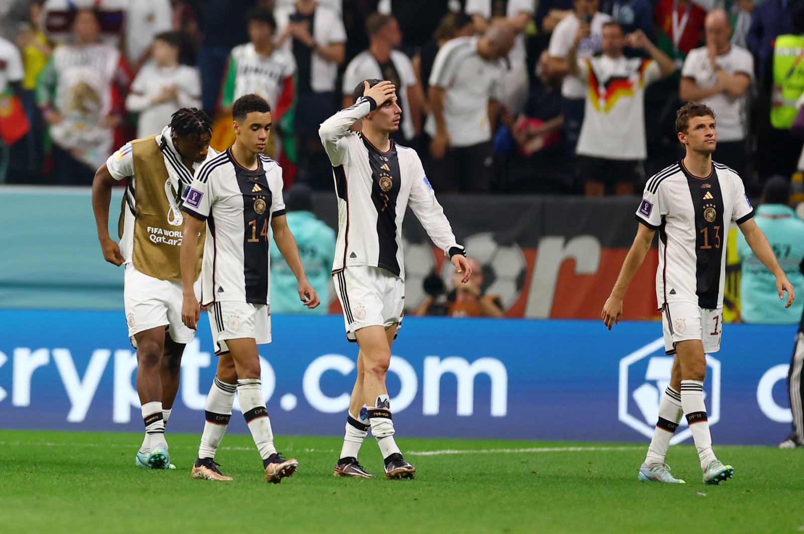 Germany&#039;s Jamal Musiala, Kai Havertz and Thomas Muller look dejected as Germany are eliminated from the World Cup after their Group E match against Costa Rica at the Al Bayt Stadium in Al Khor, Qatar, Dec. 1, 2022. (Reuters Photo)
