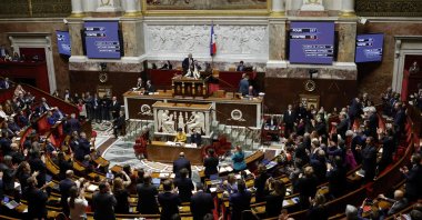 French lawmakers applaud after a vote during a session of the National Assembly on proposals by La France Insoumise (LFI) party in Paris, France, Nov. 24, 2022. (AFP Photo)