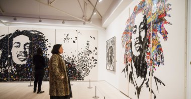 Images of the late reggae pioneer Bob Marley appear at the press launch for the exhibit "Bob Marley One Love Experience" at the Saatchi Gallery in London, U.K., Feb. 2, 2022. (AP Photo)