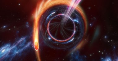 An artist illustration shows bursts of energy released when a star is torn apart by a supermassive black hole, Nov. 30, 2022. (AFP Photo) 