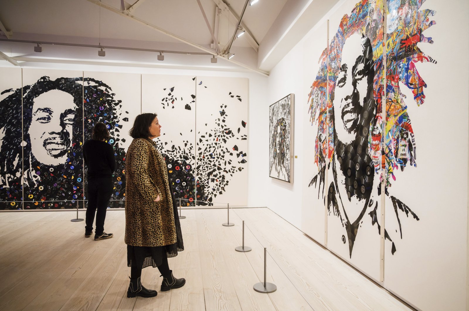 Images of the late reggae pioneer Bob Marley appear at the press launch for the exhibit "Bob Marley One Love Experience" at the Saatchi Gallery in London, U.K., Feb. 2, 2022. (AP Photo)