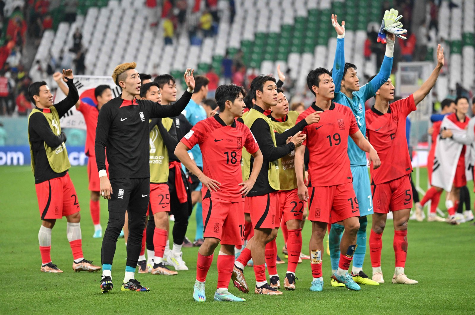 South Korea&#039;s players celebrate at the end of the Qatar 2022 World Cup Group H football match between South Korea and Portugal at the Education City Stadium in Al-Rayyan, west of Doha, Qatar, Dec. 2, 2022. (AFP Photo)