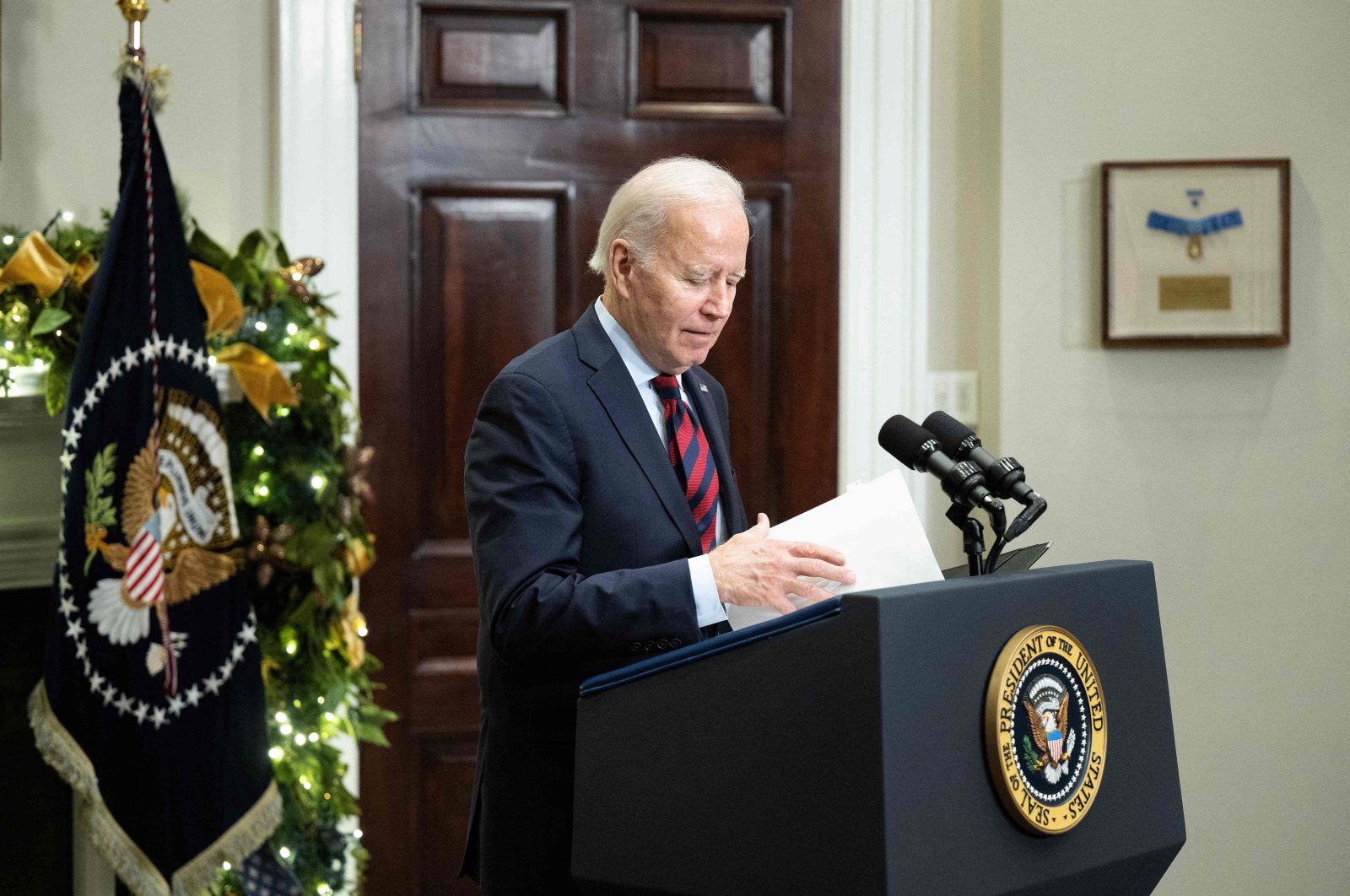 U.S. President Joe Biden speaks as he prepares to sign a resolution to avert a nationwide rail shutdown, in the Roosevelt Room of the White House in Washington, D.C., U.S., Dec. 2, 2022. (AFP Photo)