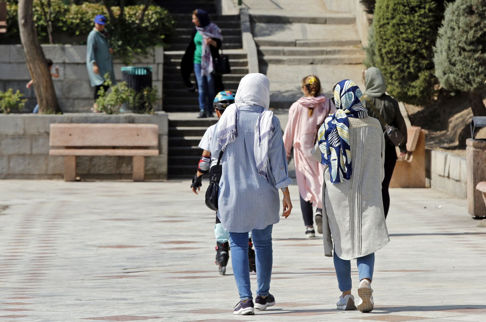 Women walk at a park in Iran&#039;s capital Tehran, Sept. 27, 2022. (AFP File Photo)