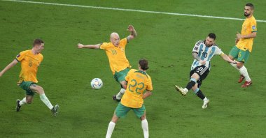 Argentina's Lionel Messi (L) shoots in a World Cup match against Australia, Doha, Qatar, Dec. 3, 2022. (AP Photo)