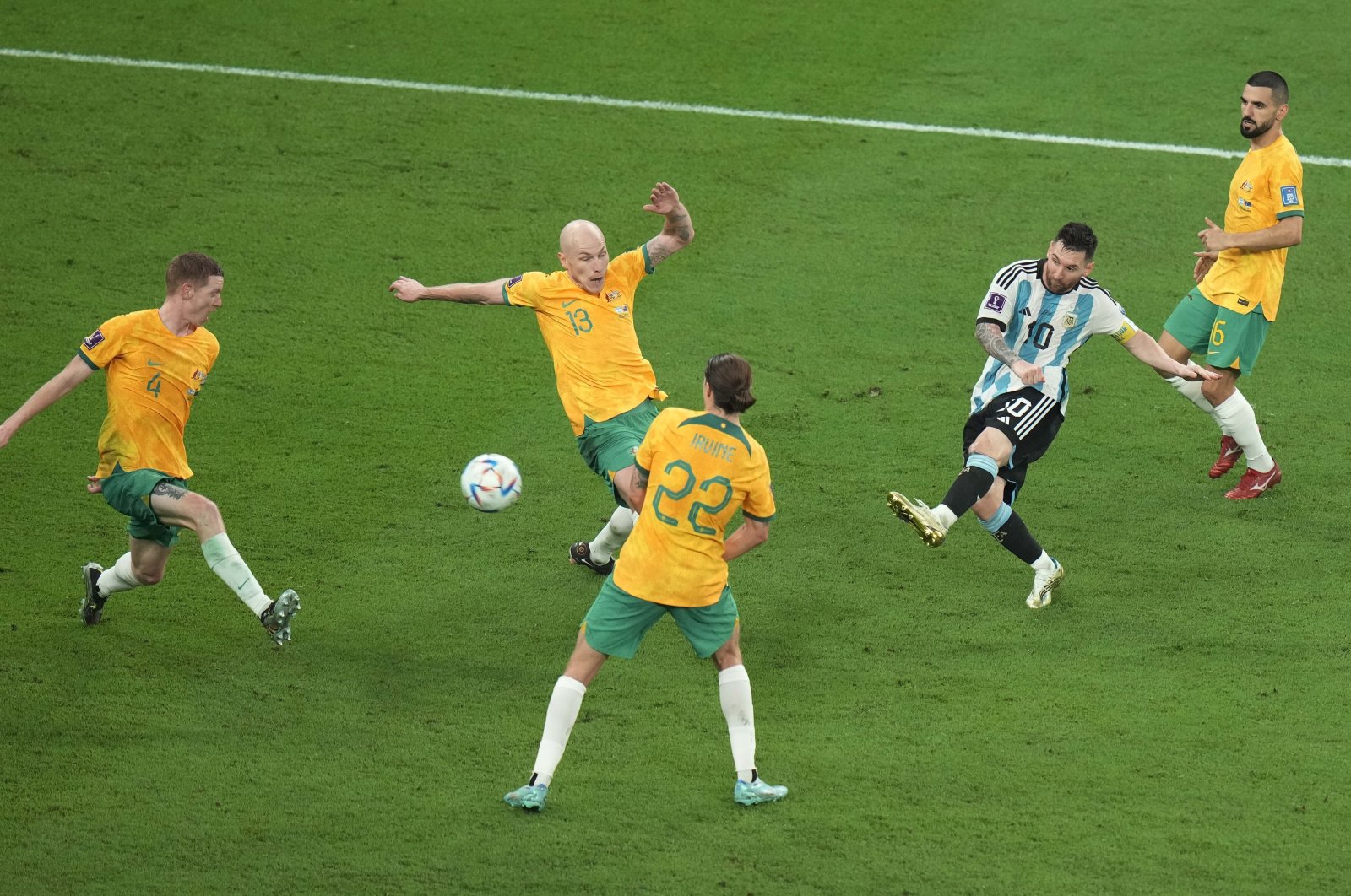 Argentina&#039;s Lionel Messi (L) shoots in a World Cup match against Australia, Doha, Qatar, Dec. 3, 2022. (AP Photo)