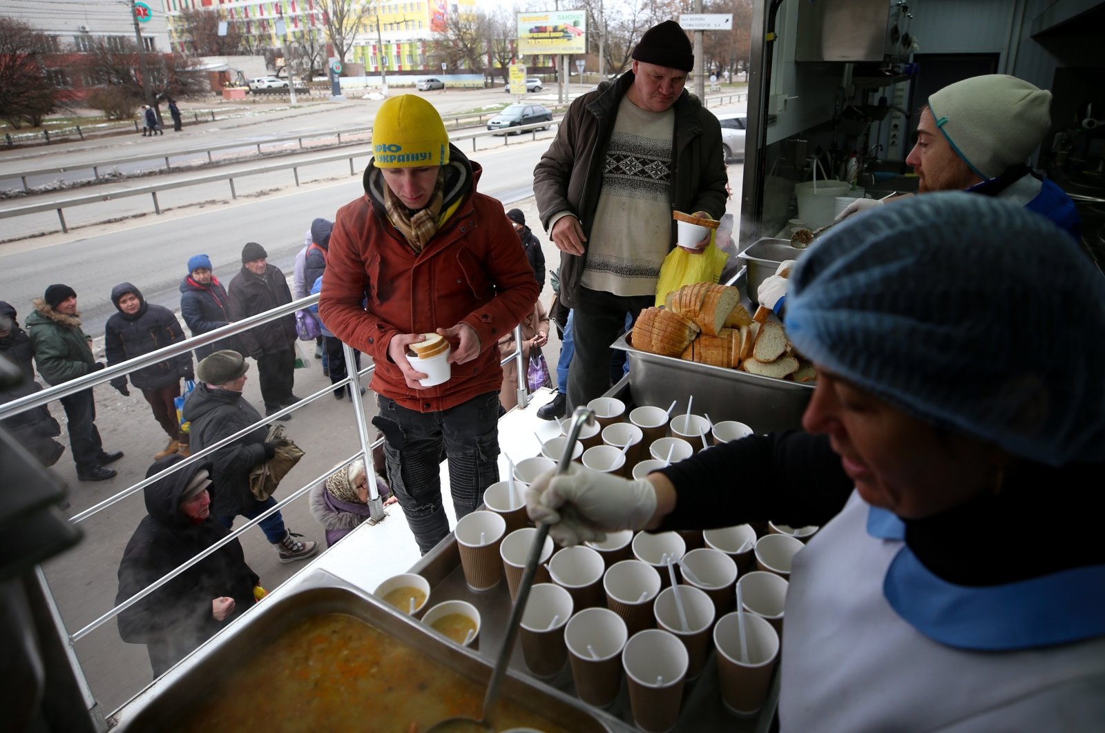 People receive meals from AFAD&#039;s mobile kitchen, in Chernihiv, Ukraine, Dec. 4, 2022. (AA Photo) 