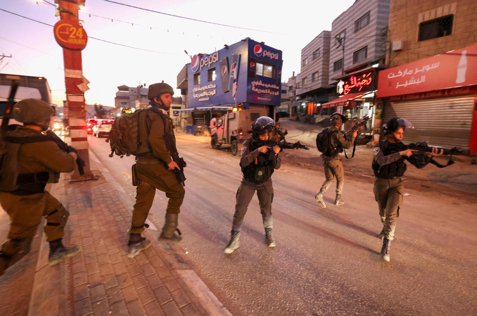Israeli security forces during a search in the city of Hawara, occupied West Bank, Palestine, Dec. 2, 2022. (AFP Photo)