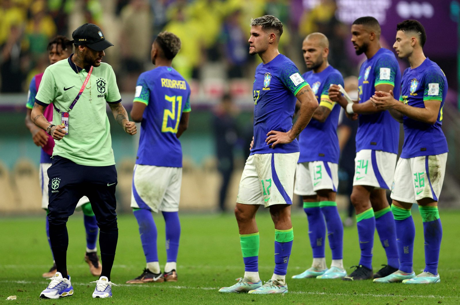Brazil&#039;s Neymar (L) and teammates react at the end of the Qatar 2022 World Cup Group G football match against Cameroon, Lusail, Doha, Dec. 2, 2022. (AFP Photo)