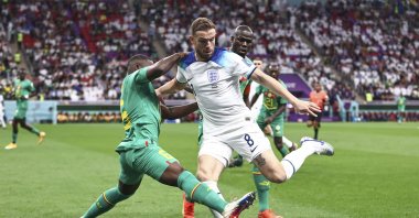 England's Jordan Henderson in action with Senegal's Nampalys Mendy during the World Cup round of 16 match at Al Bayt Stadium, Doha, Qatar, Dec. 4, 2022. (AA Photo)