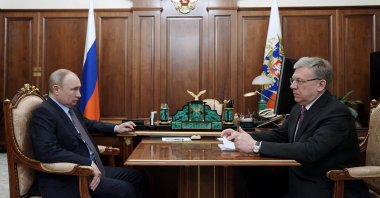 This file photo shows Russian President Vladimir Putin (L) during the meeting with then Audit Chamber head Alexei Kudrin (R) at the Kremlin in Moscow, Russia, March 23, 2021. (AFP Photo)