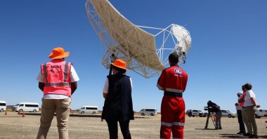 People look at South Africa's prototype dish of the Square Kilometre Array-Mid telescope outside the town of Carnarvon, South Africa, Dec. 5, 2022. (Reuters Photo)
