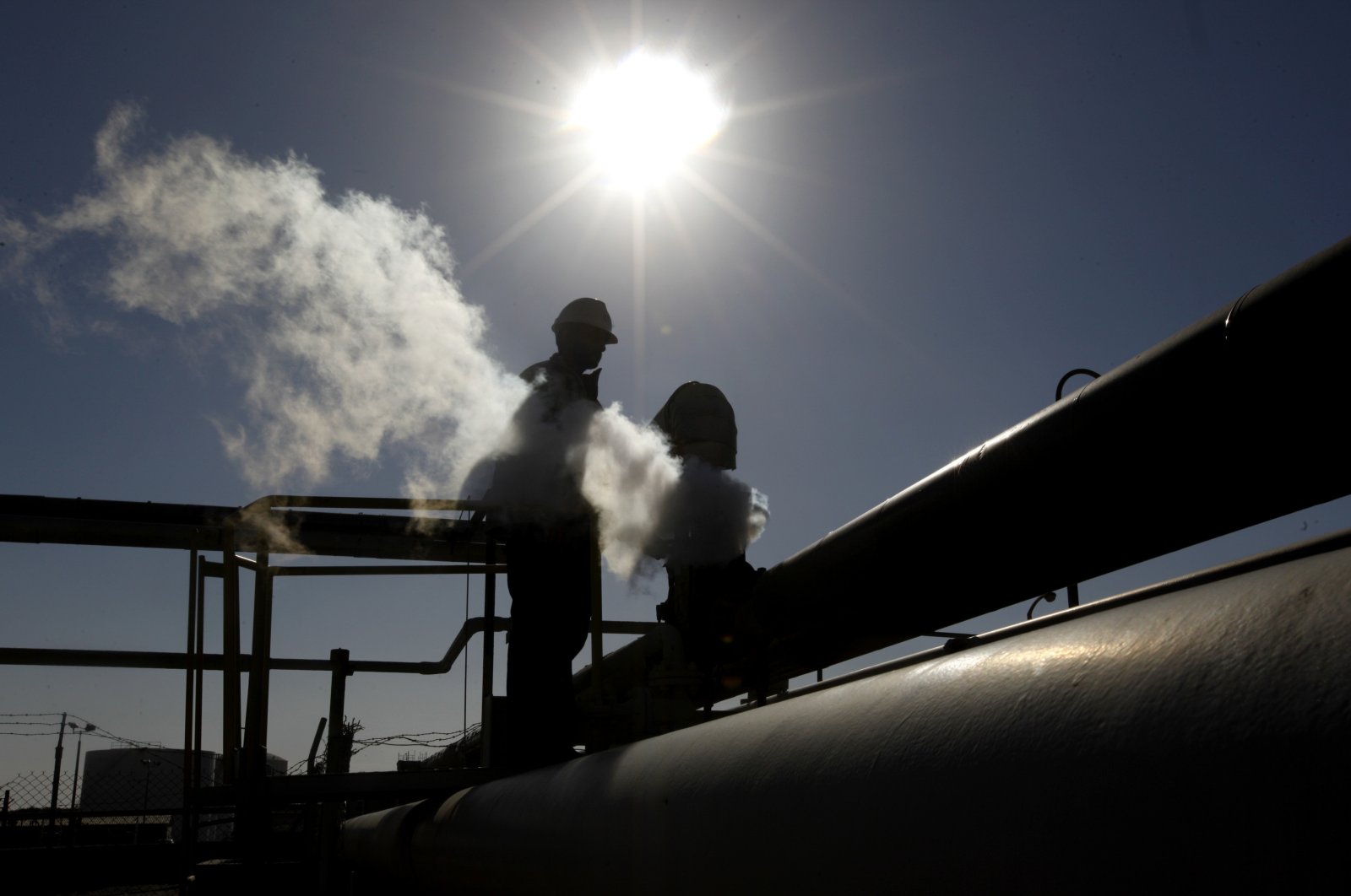 In this Feb. 26, 2011 file photo, a Libyan oil worker, works at a refinery inside the Brega oil complex, in Brega, eastern Libya. (AP File Photo)
