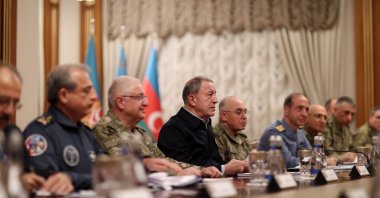 Defense Minister Hulusi Akar (3rd L) is seen with high-level military officials at Azerbaijan's Defense Ministry in Baku, Azerbaijan, Dec. 5, 2022. (AA Photo)