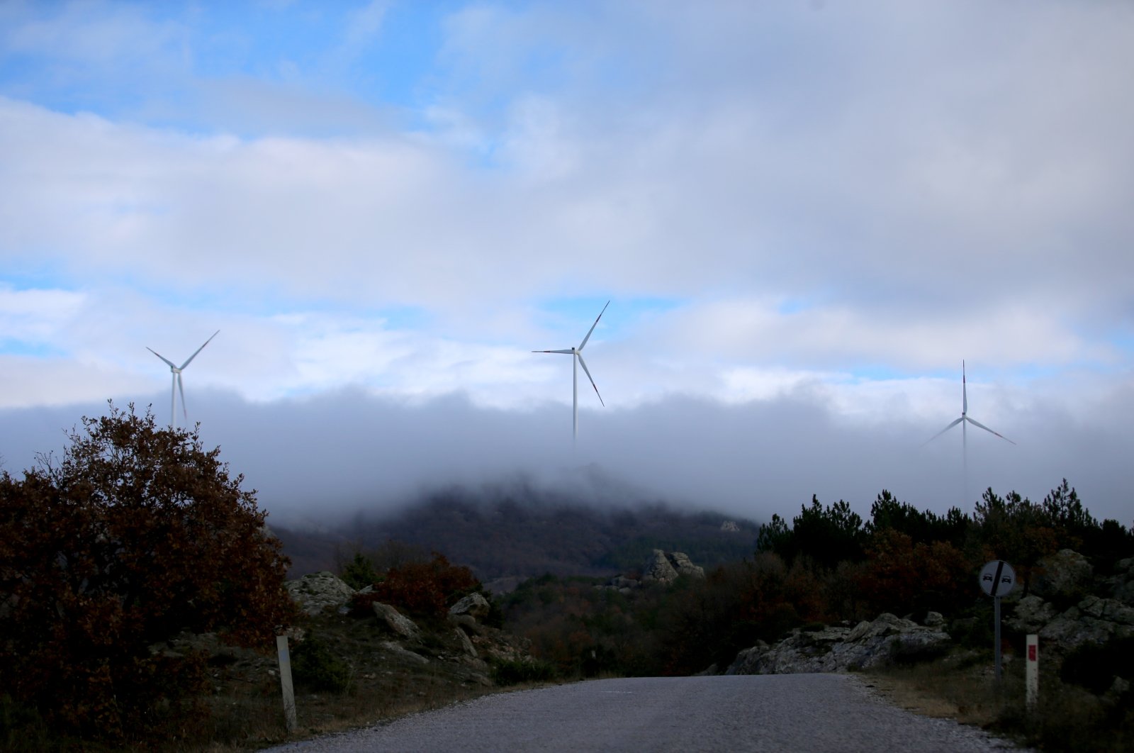 Wind turbines rise out of the fog cover in Kırklareli province, northwestern Türkiye, Dec. 2, 2022. (AA Photo)