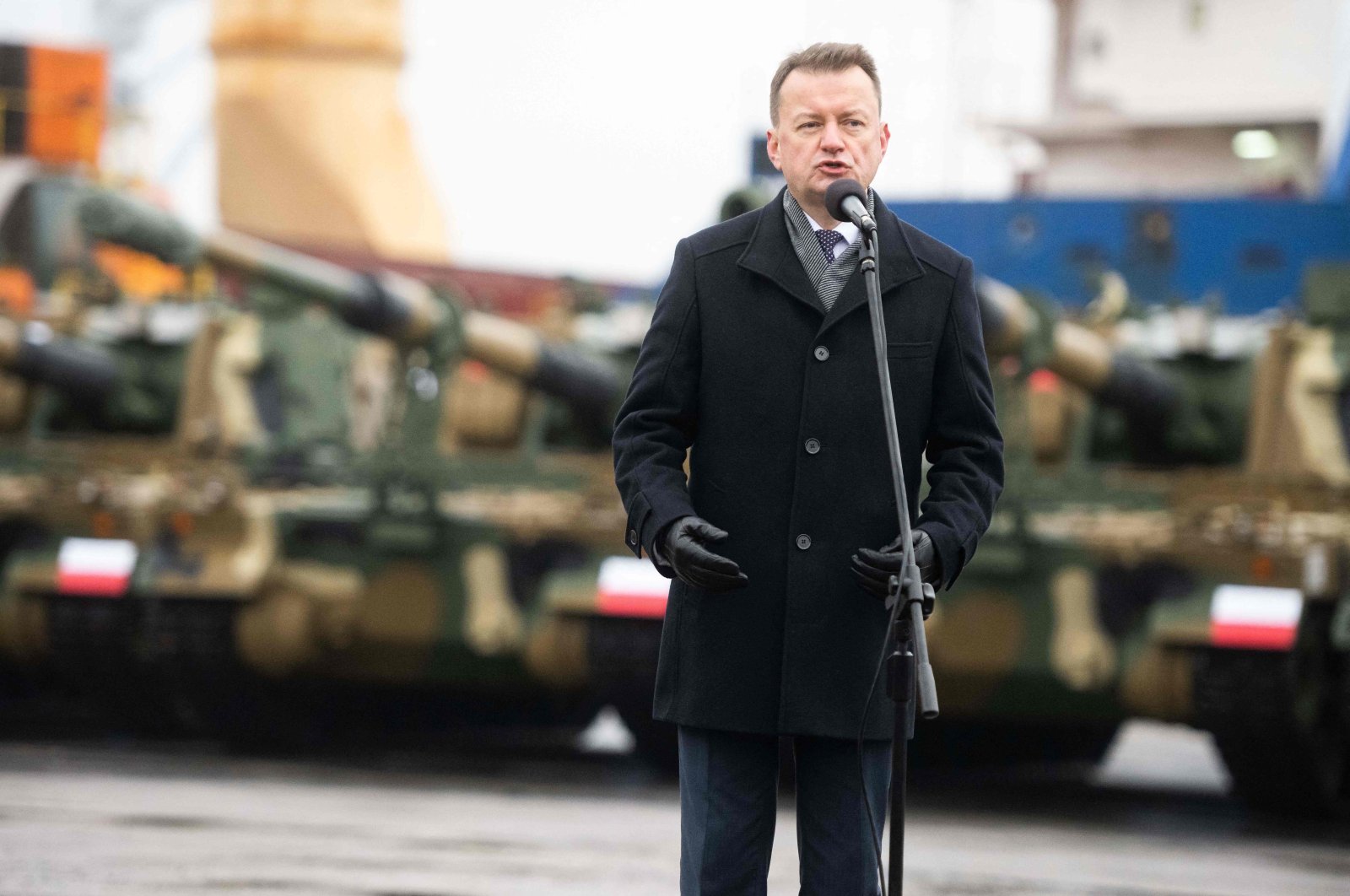 Polish Defence Minister Mariusz Blaszczak speaks during the acceptance of the first South Korean K2 battle tanks and South Korean K9 howitzers for Poland on Dec. 6, 2022 at the Baltic Container Terminal in Gdynia. (AFP Photo)