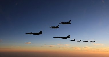 Japan Air Self-Defense Force F-2 fighters hold a joint military drill with the U.S. 28th Bomb Wing B-1B bombers and F-16 fighters off in the southernmost main island of Kyushu, Japan, Nov. 5, 2022. (Reuters Photo)